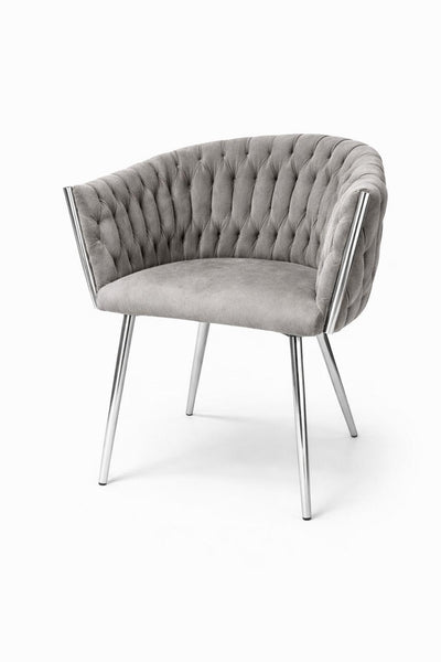 Poltroncina imbottita in velluto grigia con gambe cromate
